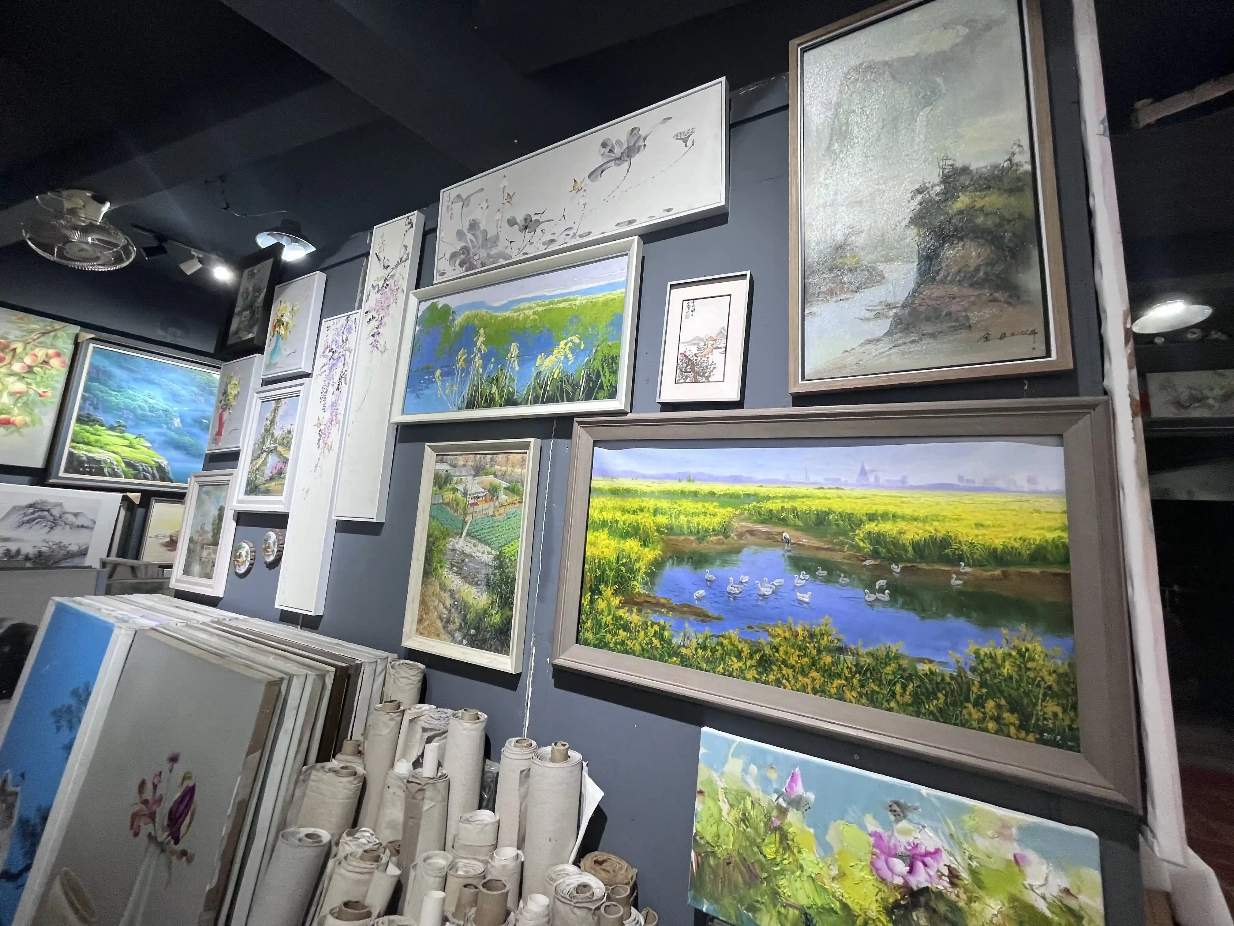 Artist working on a hand-painted canvas